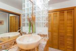 Enjoy the luxury of a full washer and dryer in the guest bathroom